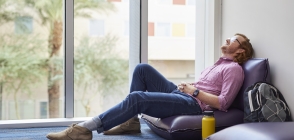 Thunderbird MGM student Sam Richardson relaxes in the meditation room at One Global Place