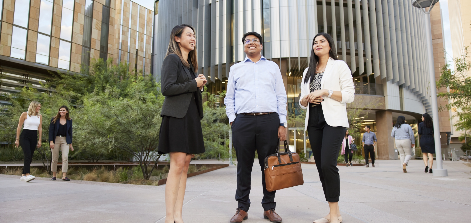 Thunderbird students stand outside its new global headquarters in Phoenix