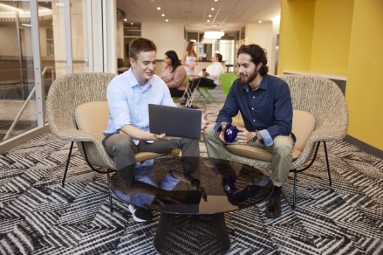 Thunderbird students hang out in the Africa and the Middle East Lounge at global headquarters