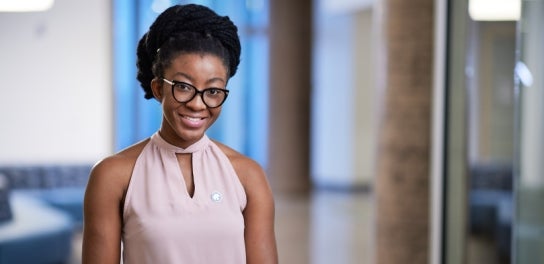 Thunderbird Undergraduate student smiling at the camera