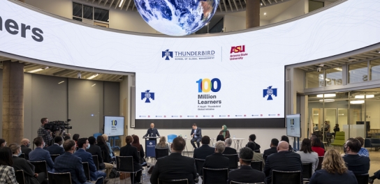 Image of the 100 Million Learners announcement in the Global Forum as seen from above